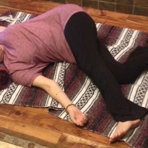 Restorative Pose Of The Month - Supine Revolved Triangle